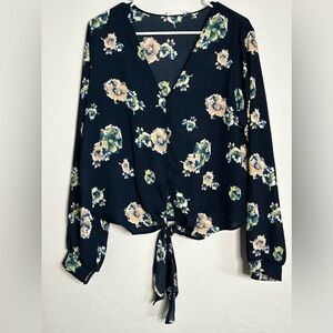 Floral knotted blouse.